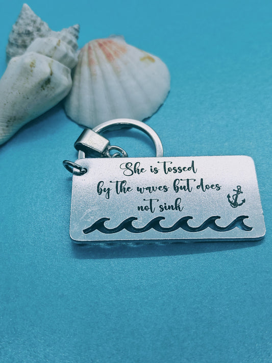 'TOSSED BY THE WAVES' Keyring
