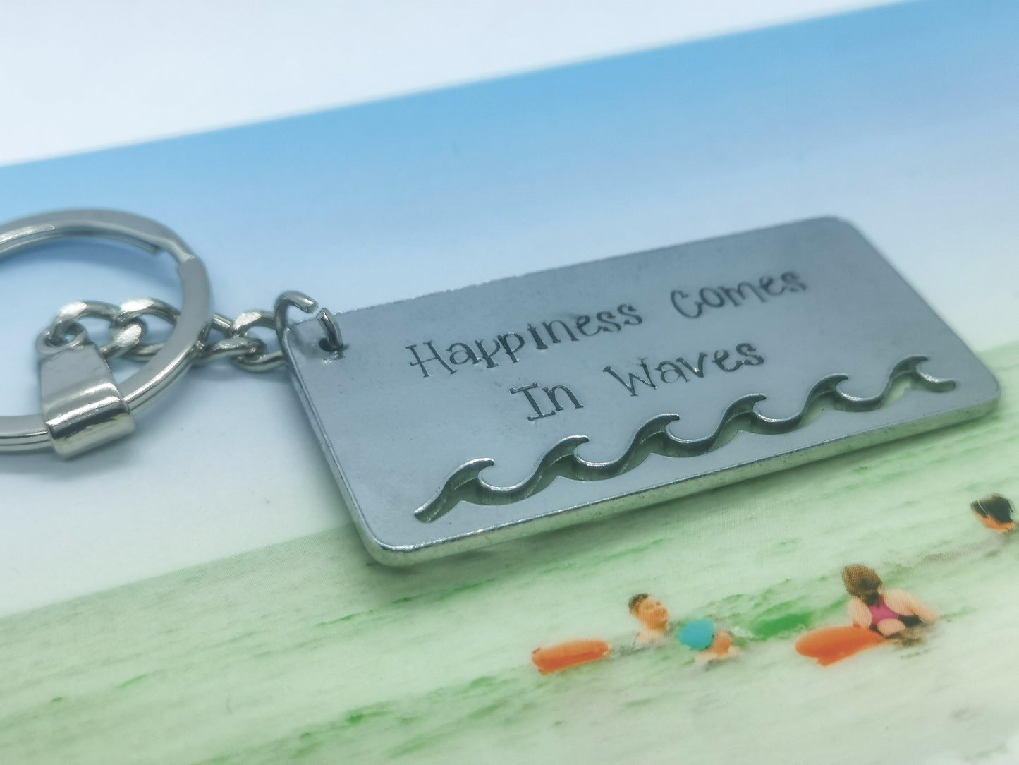 'HAPPINESS COMES IN WAVES' Keyring