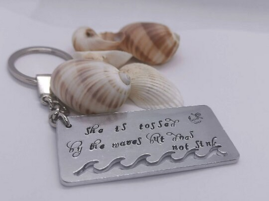 'TOSSED BY THE WAVES' Keyring